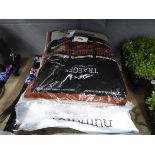 +VAT Bag of wood chips and granulated fertiliser