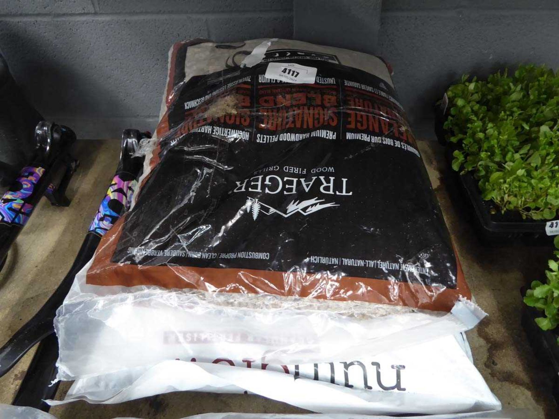 +VAT Bag of wood chips and granulated fertiliser