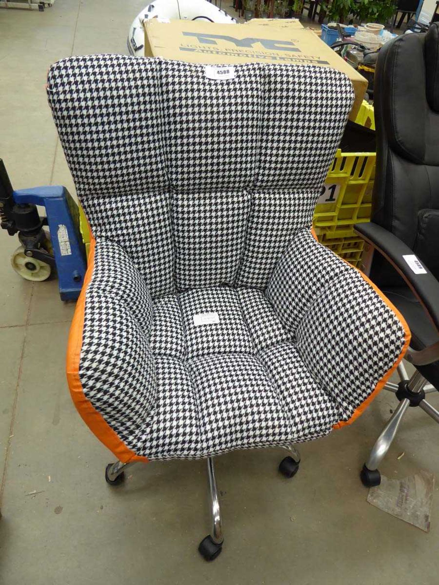 +VAT Black and white check armchair with orange sides