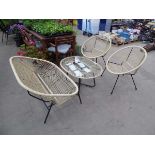 Four piece string garden set comprising two seater bench, two chairs and a glass topped coffee