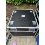 3 black and silver wheeled flight cases