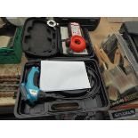 Set of paint brushes, ring borescope inspection camera, and Black & Decker cable protector
