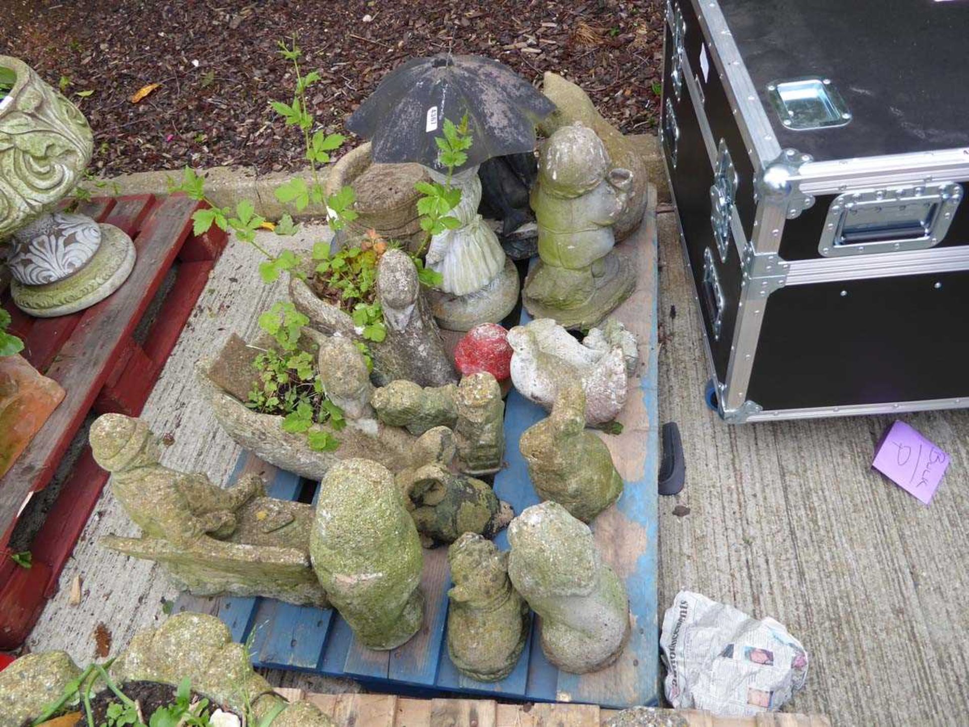 Pallet of concrete garden ornaments