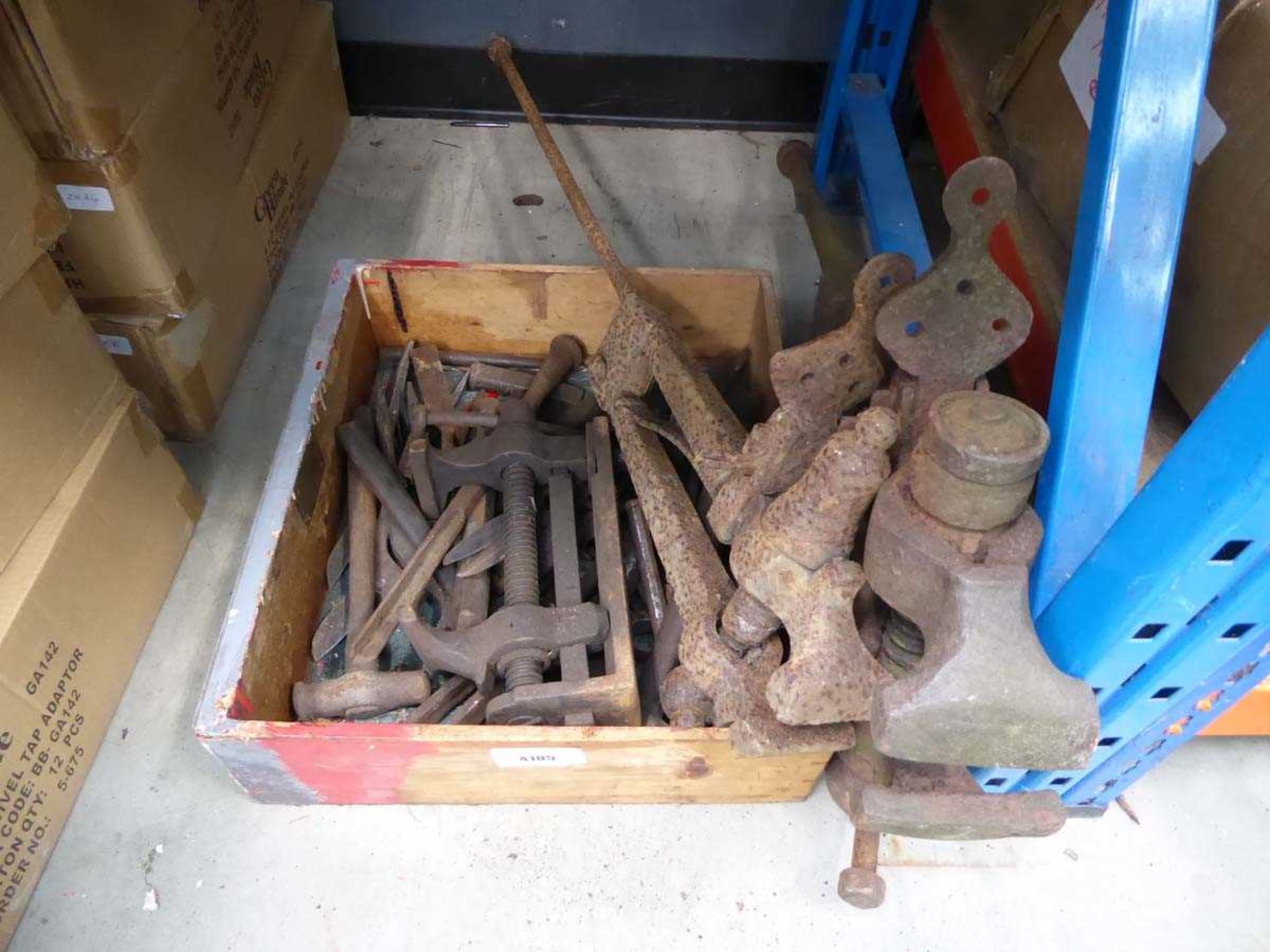 +VAT Box containing vintage blacksmiths and other tools and leg vices