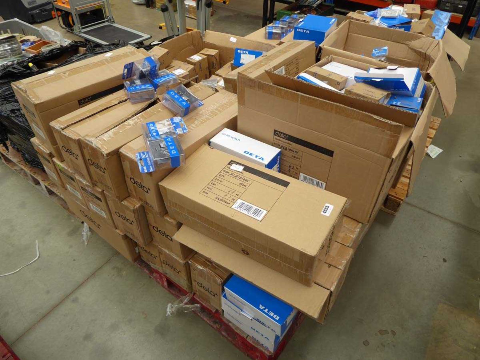 2 pallets containing electrical switches, sockets, TV outlets, etc.