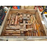 Wooden drawer of vintage wooden planes and chisels