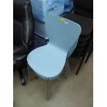 4 blue wooden stacking chairs