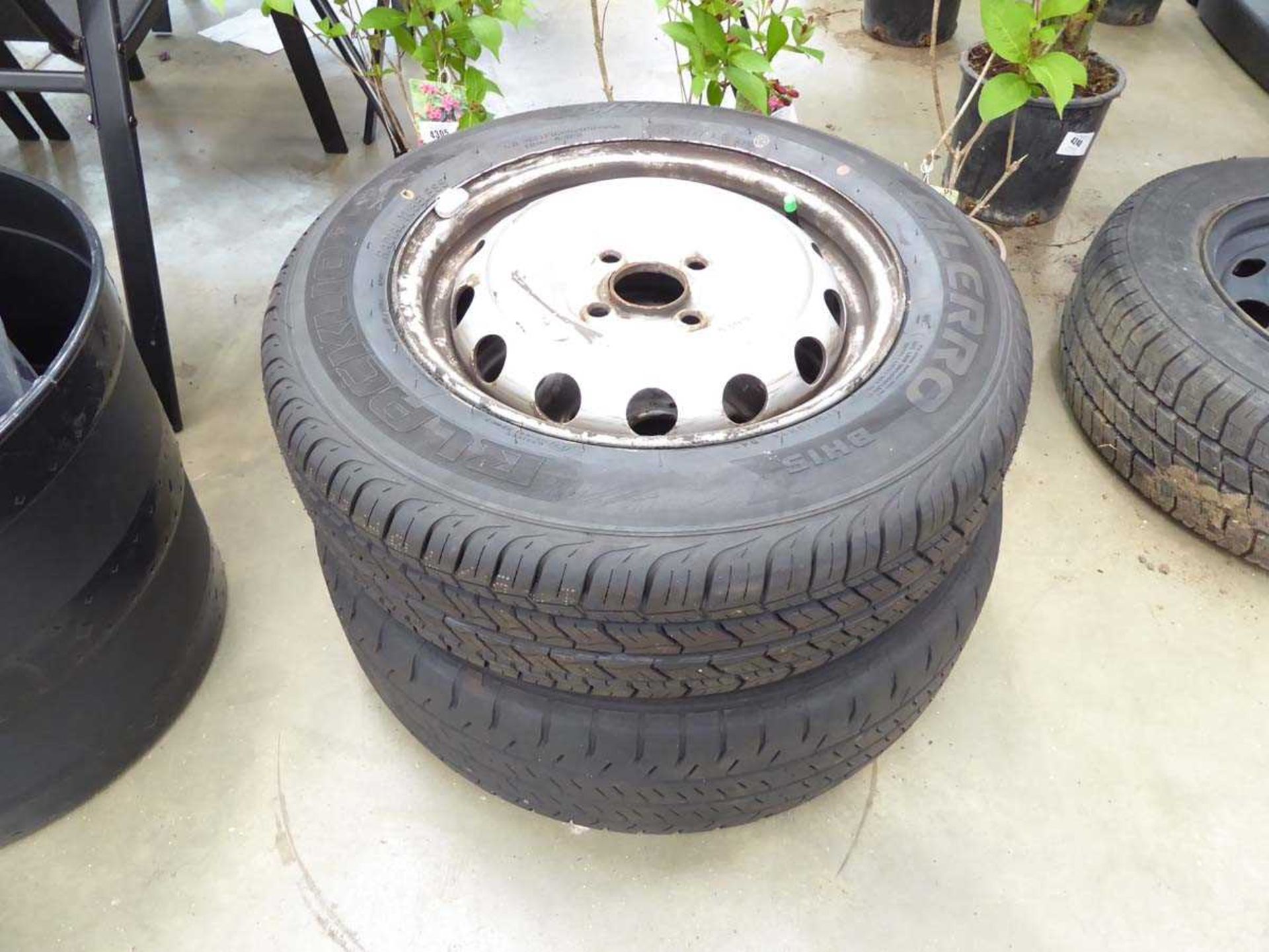 +VAT Two assorted wheels and tyres