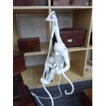 Seletti climbing monkey lamp in white No plug, presumably for hardwiring