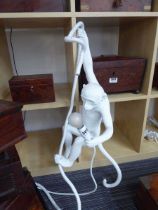 Seletti climbing monkey lamp in white No plug, presumably for hardwiring