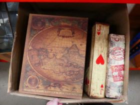 Box containing quantity of playing card and world map storage boxes