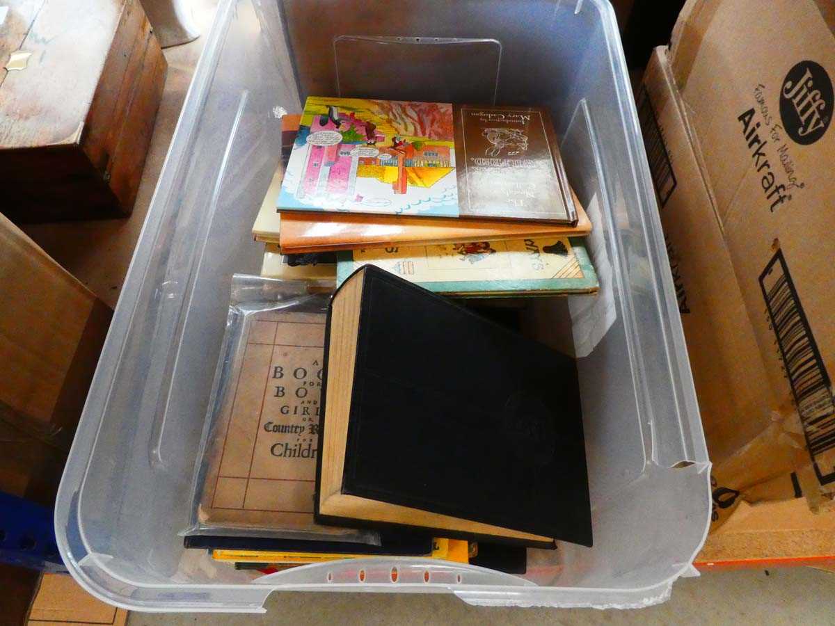 Box containing children's books and novels