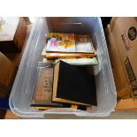 Box containing children's books and novels