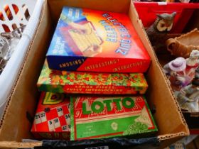 Box containing board games and jigsaw puzzles