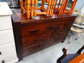 Dark wood chest of 3 over 4 drawers