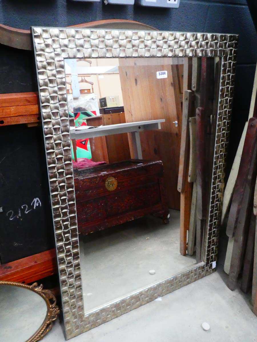 Rectangular bevelled mirror in silver finished frame