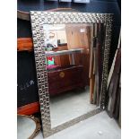 Rectangular bevelled mirror in silver finished frame