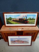 Two steam train and coastal prints