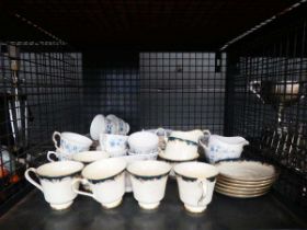 Cage containing floral patterned Colclough crockery plus Minton cups and saucers