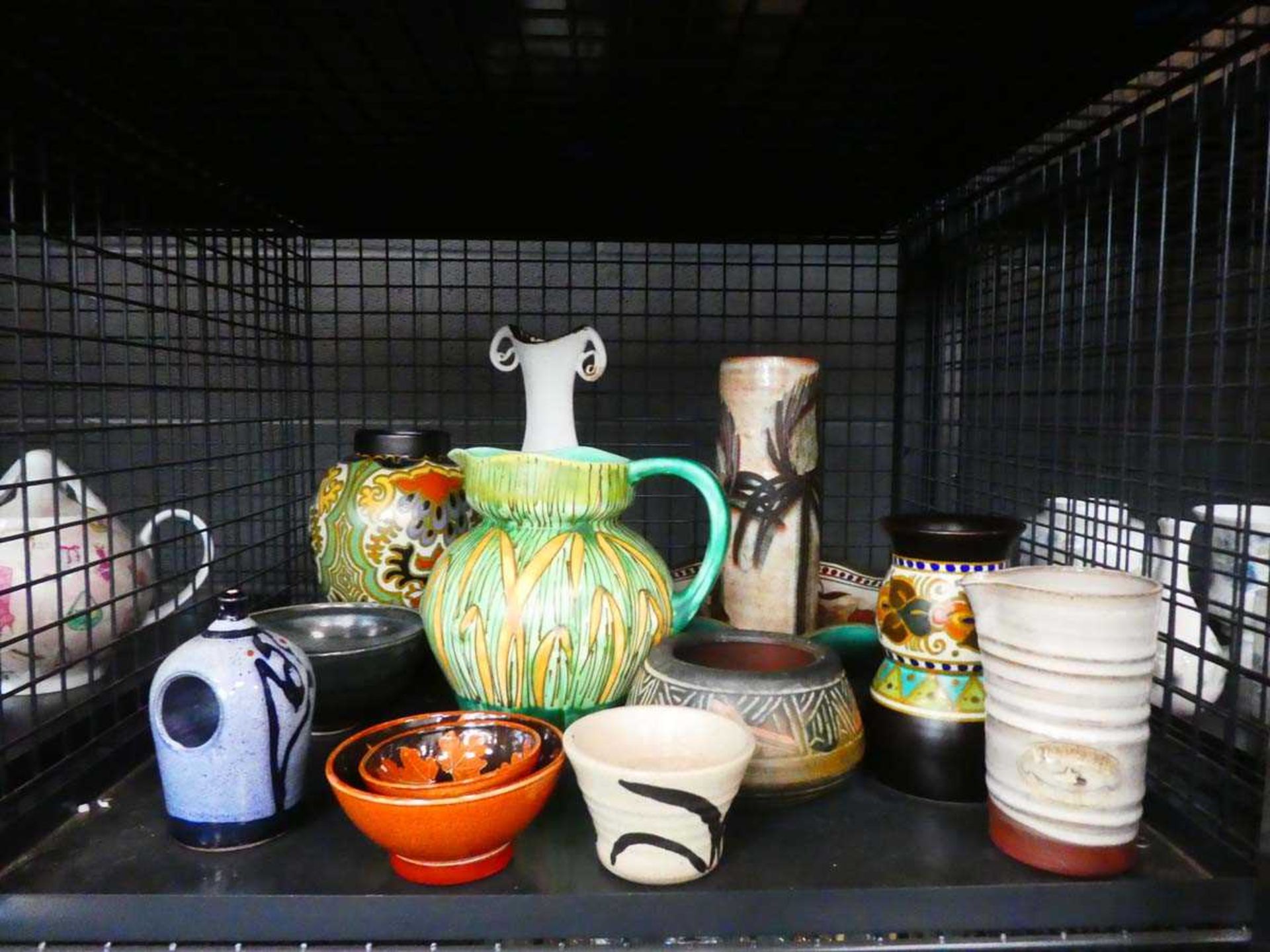 Cage containing Dutch and other studio pottery, plus Crown Cauldon water jug