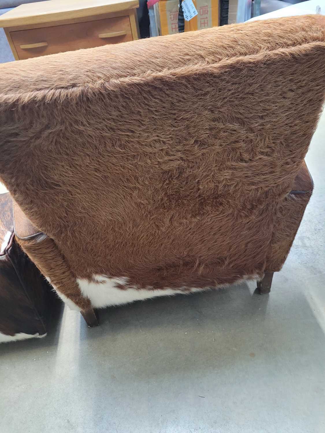 Cowhide upholstered armchair with matching footstool Some scuffing to legs - Image 6 of 6