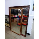 Large rectangular bevelled mirror in faux walnut frame