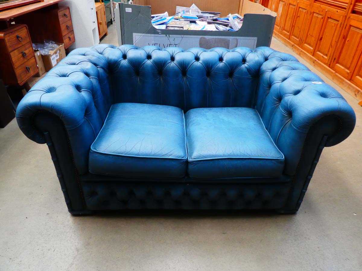 Blue leather effect two seater Chesterfield sofa