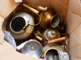 Box containing copper and brass kettles