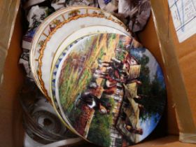 Box containing collectors plates and floral patterned dinner plates