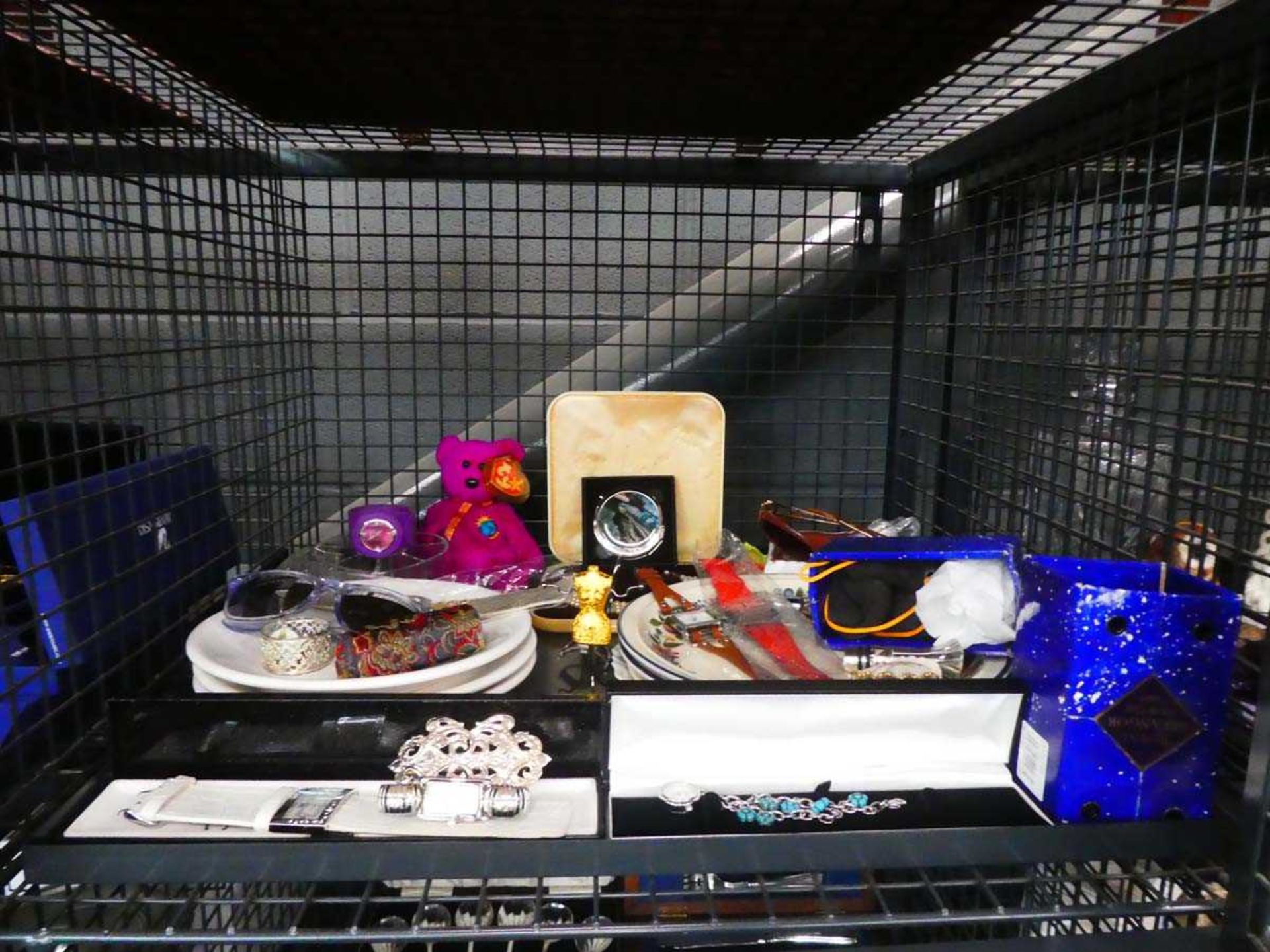 Cage containing TY teddy bear, wristwatches, costume jewellery, and crocker