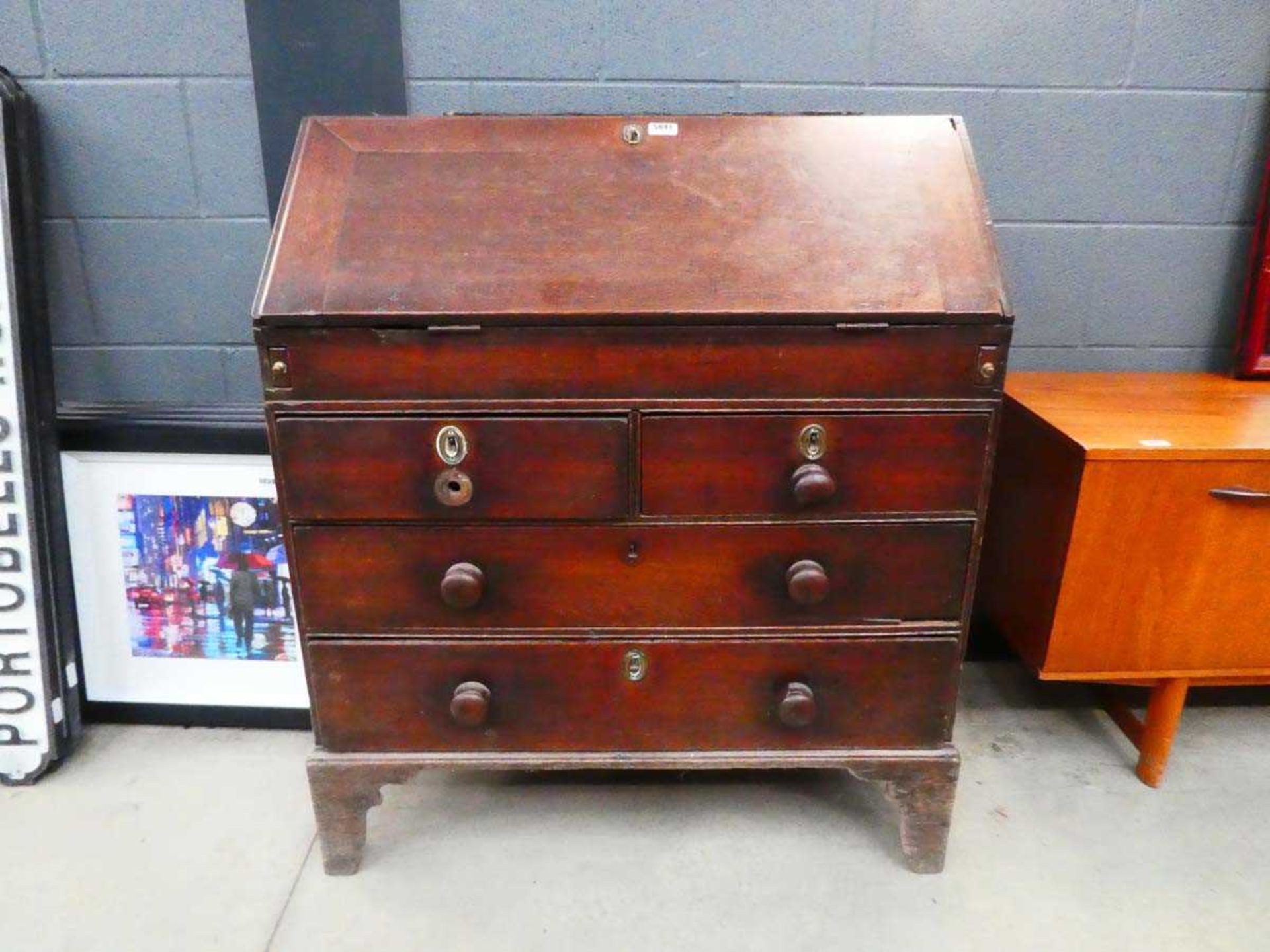 Georgian oak bureau with drawers under