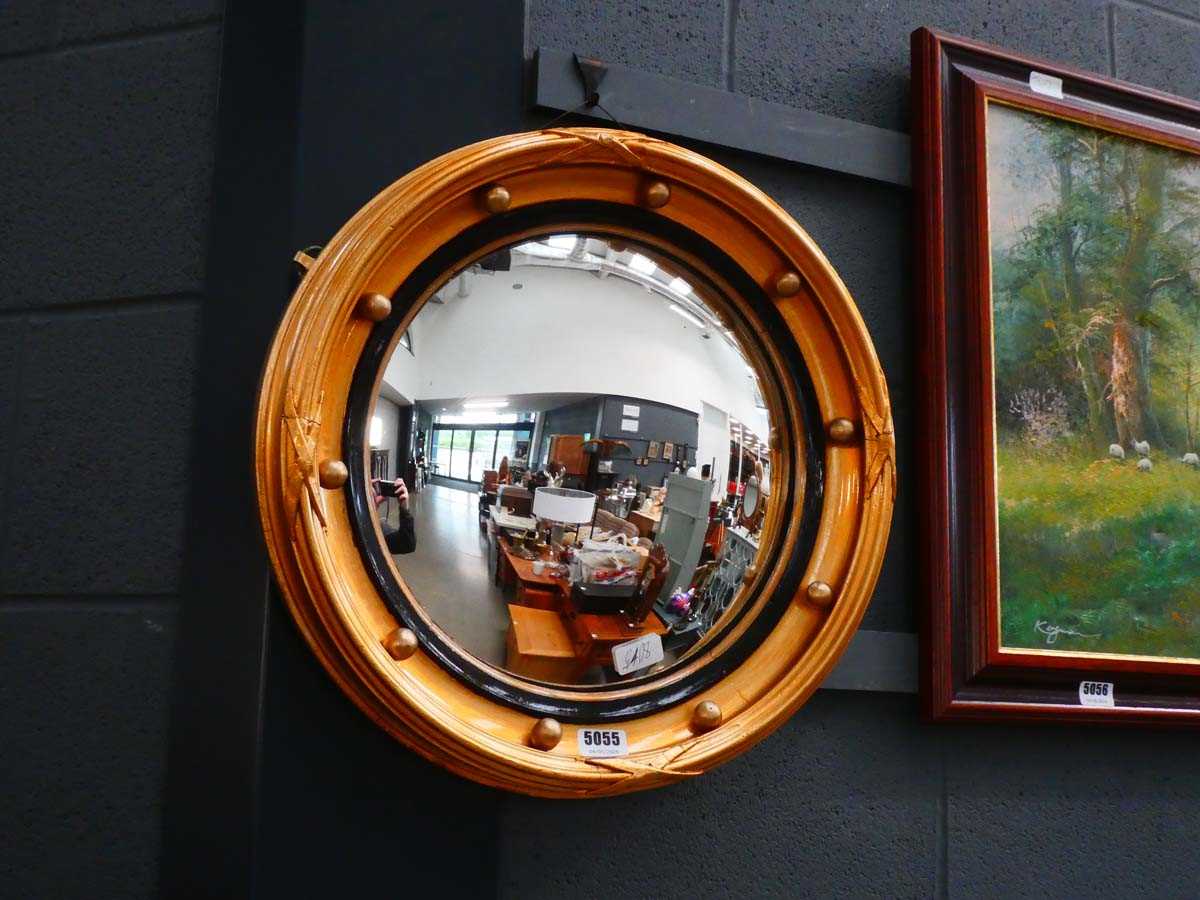 Convex mirror in gilt frame