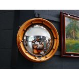 Convex mirror in gilt frame