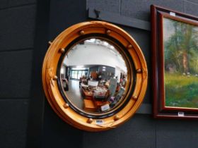 Convex mirror in gilt frame