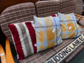 Five tartan and striped cushions