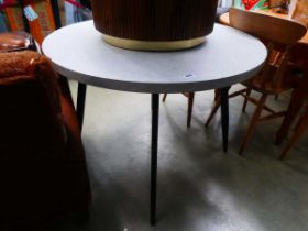 Circular marble effect dining table