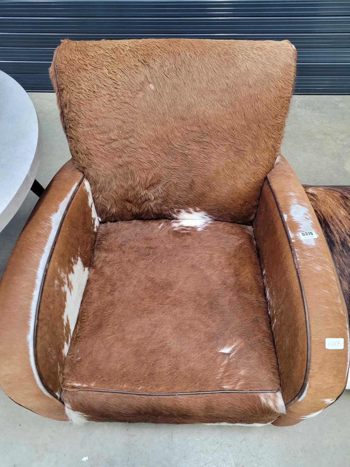 Cowhide upholstered armchair with matching footstool Some scuffing to legs - Image 4 of 6