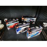 Cage containing 4 Lego racing car kits