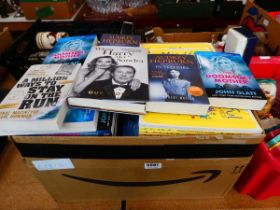 Box containing biographies and novels