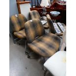 Set of four chromed and fabric swivel chairs