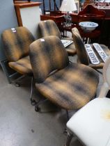 Set of four chromed and fabric swivel chairs