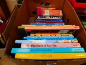 Box containing Enid Blyton and other children's novels