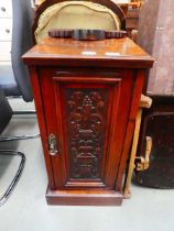 Edwardian pot cupboard with carved panel