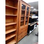 Glazed pine display cabinet with drawers under