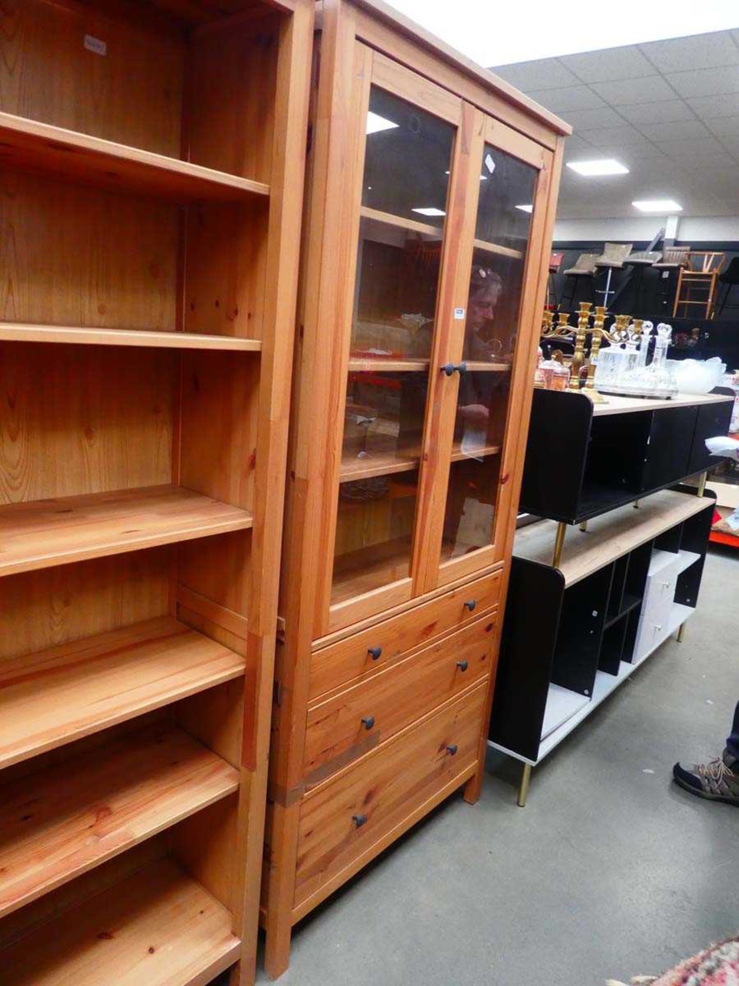 Glazed pine display cabinet with drawers under