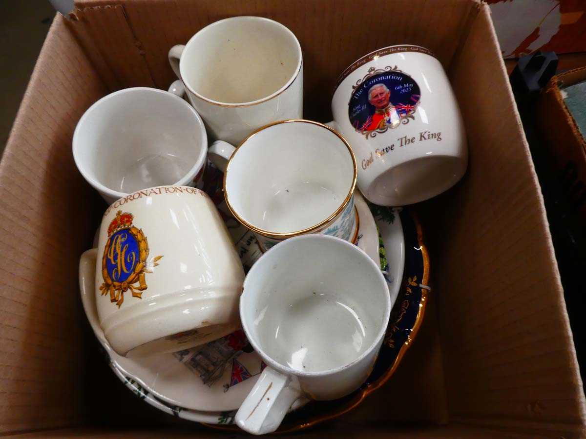 Box containing collectors plates and commemorative mugs