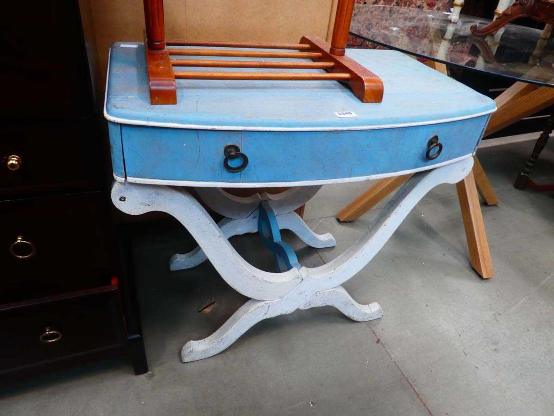 Painted table with X shaped stretchers and single drawer