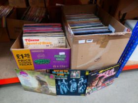 2 boxes containing vinyl records