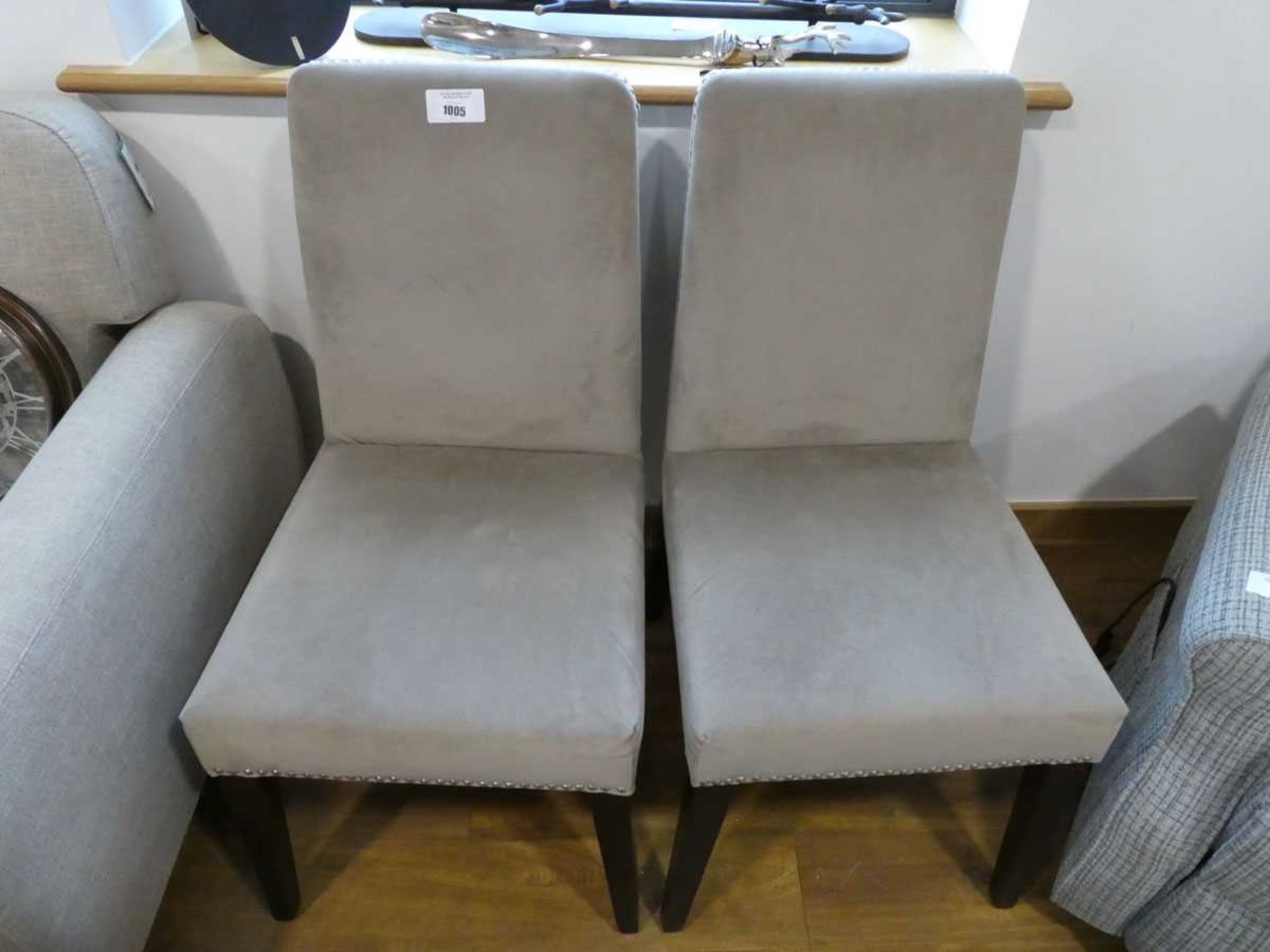 +VAT Pair of grey and black stud edged dining chairs