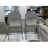 +VAT Pair of light grey metal soft seated folding chairs